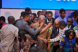 Our Executive Director in a hanshake with the president of Ghana
